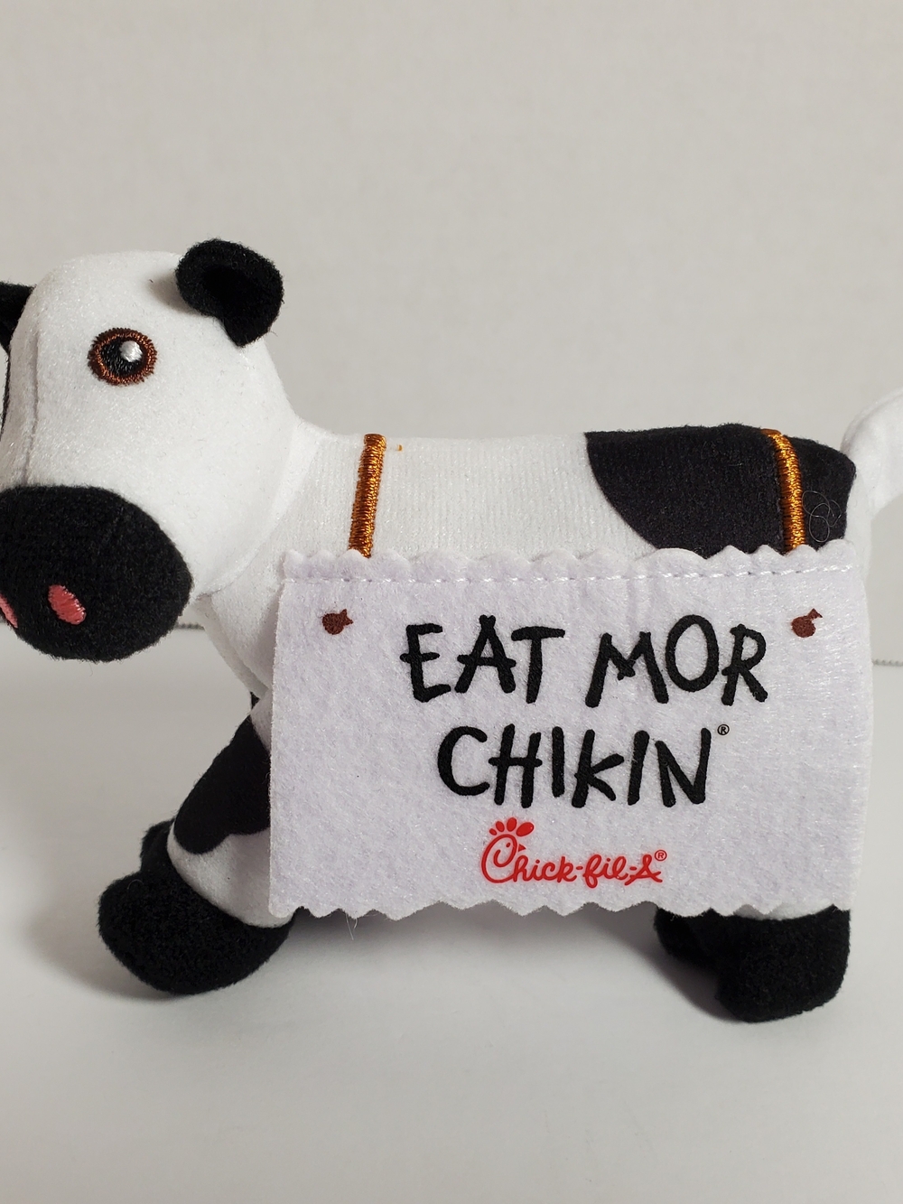Chick-fil-A Black & White Plush Cow with 'Eat Mor Chikin' Sign